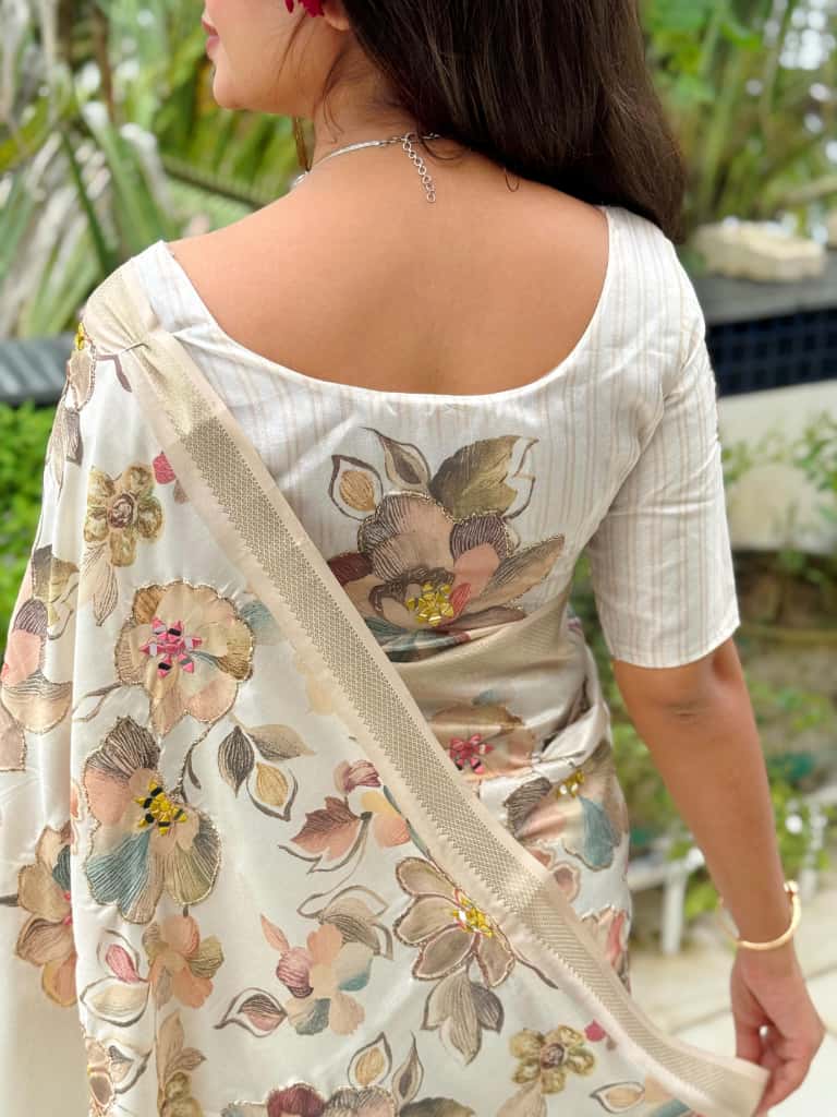 A designer tusser colored printed beauty for your wardrobe with unique Hand mirror work saree